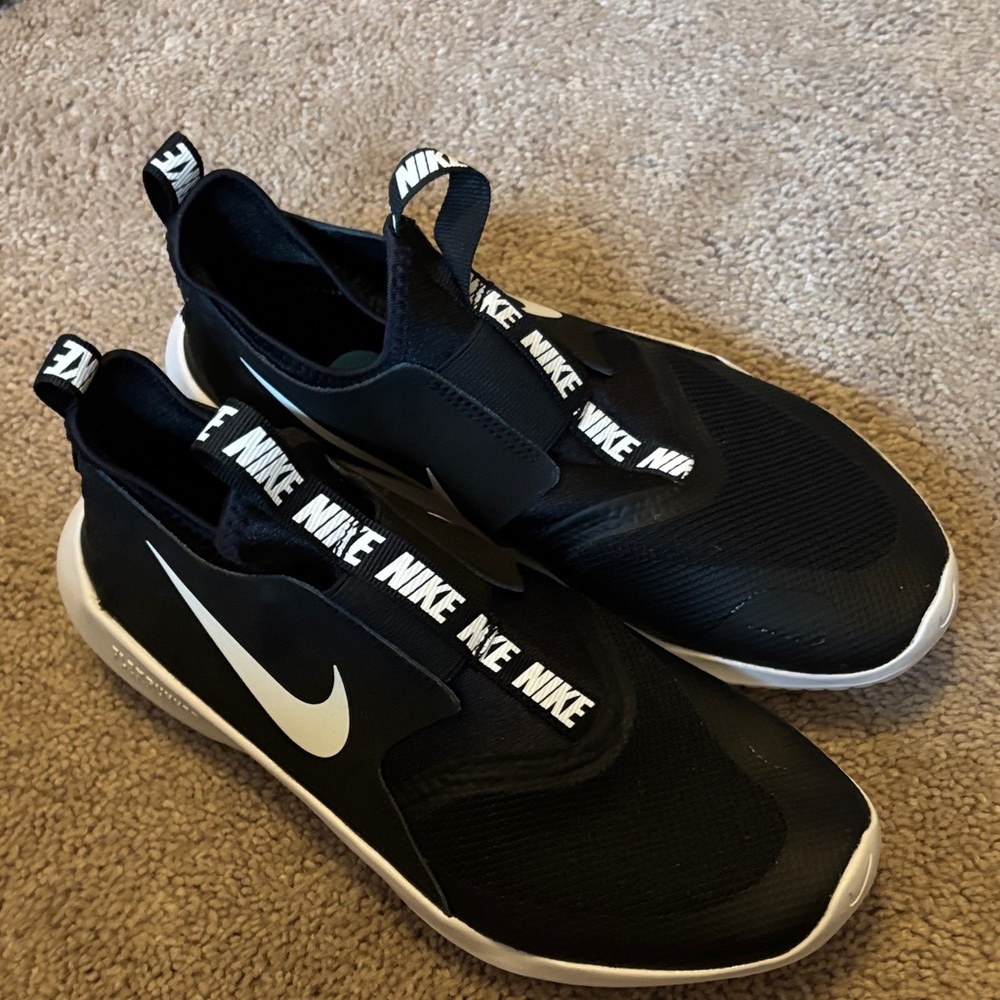 Nike youth size 6 Black and White Slip-On Sneakers